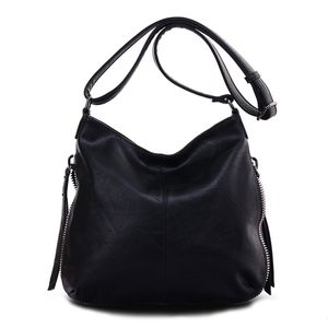 Besace en cuir synthétique avec des zips latéraux décoratifs