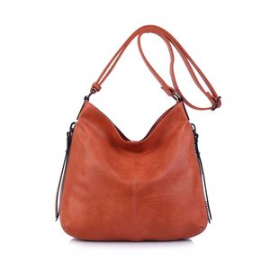 Besace en cuir synthétique avec des zips latéraux décoratifs