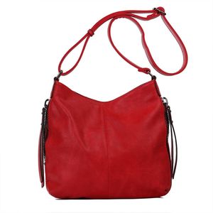 Besace en cuir synthétique avec des zips latéraux décoratifs