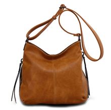 Besace en cuir synthétique avec des zips latéraux décoratifs