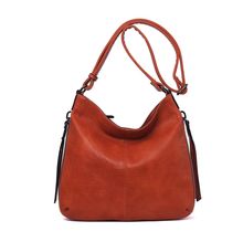 Besace en cuir synthétique avec des zips latéraux décoratifs