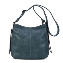 Besace en cuir synthétique avec des zips latéraux décoratifs