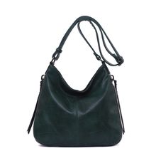 Besace en cuir synthétique avec des zips latéraux décoratifs