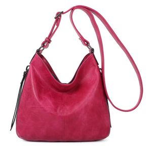 Besace en cuir synthétique avec des zips latéraux décoratifs