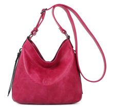 Besace en cuir synthétique avec des zips latéraux décoratifs