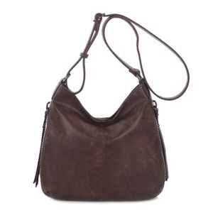 Besace en cuir synthétique avec des zips latéraux décoratifs