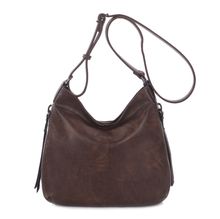 Besace en cuir synthétique avec des zips latéraux décoratifs