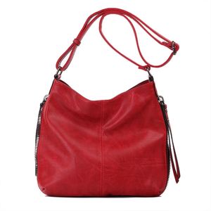 Besace en cuir synthétique avec des zips latéraux décoratifs