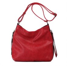 Besace en cuir synthétique avec des zips latéraux décoratifs