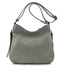 Besace en cuir synthétique avec des zips latéraux décoratifs