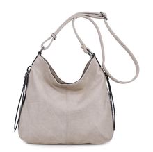 Besace en cuir synthétique avec des zips latéraux décoratifs