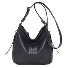 Besace en cuir synthétique avec des zips latéraux décoratifs