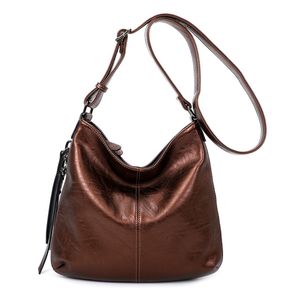 Besace en cuir synthétique avec des zips latéraux décoratifs