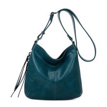 Besace en cuir synthétique avec des zips latéraux décoratifs