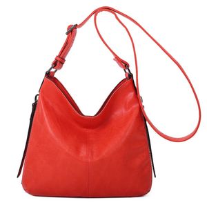 Besace en cuir synthétique avec des zips latéraux décoratifs