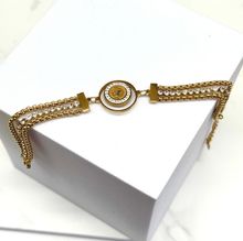 Bracelet doré à triple chaîne avec un médaillon figuré impériale "ELIZABETH II AUSTRALIA 1998"