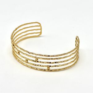 Bracelet jonc manchette ouvert à bandes ondulées avec points discrets