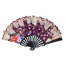 Éventail décoré de motifs fleurs et ornementales avec paillettes