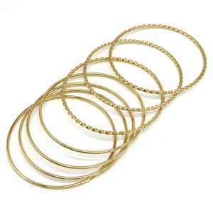 Bracelet deux joncs distincts en acier de couleur doré lot de 7 pièces