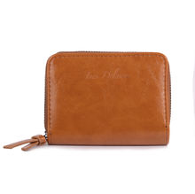 Portefeuille intégralement zippé sur les trois côtés en simili cuir