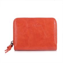 Portefeuille intégralement zippé sur les trois côtés en simili cuir