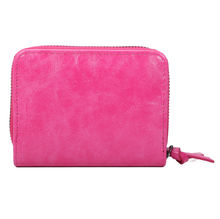 Portefeuille intégralement zippé sur les trois côtés en simili cuir