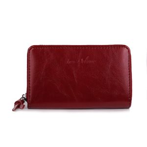 Portefeuille uni de format moyen avec une fermeture complète