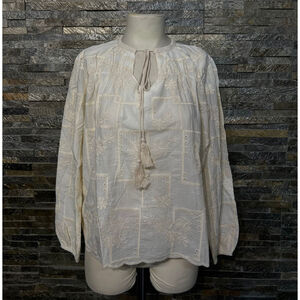Blouse bohème à broderie anglaise col rond avec liens à nouer