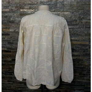 Blouse bohème à broderie anglaise col rond avec liens à nouer