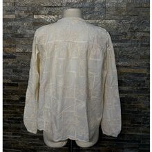 Blouse bohème à broderie anglaise col rond avec liens à nouer