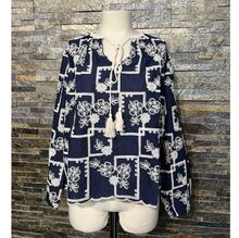 Blouse bohème à broderie anglaise col rond avec liens à nouer