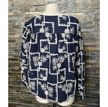 Blouse bohème à broderie anglaise col rond avec liens à nouer