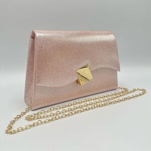 Pochette pailletée avec rabat asymétrique à fermoir doré géométrique