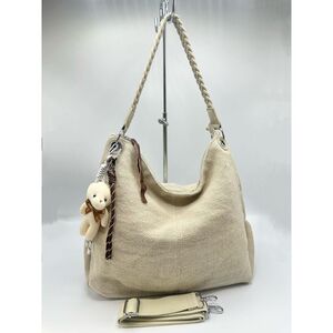 Sac à main de style hobo en toile texturée avec anse tressée