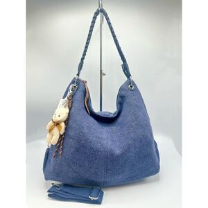 Sac à main de style hobo en toile texturée avec anse tressée