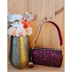 Sac forme cylindrique avec des sequins à fermeture éclair