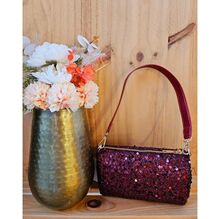 Sac forme cylindrique avec des sequins à fermeture éclair