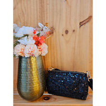 Sac forme cylindrique avec des sequins à fermeture éclair