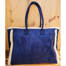 Sac à épaule en suédine orné d'une bordure en moumoute blanche