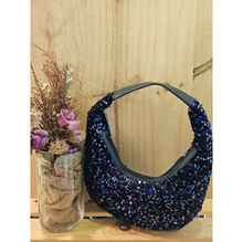 Sac style hobo entièrement recouvert de sequins brillants