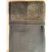 Pantalon legging polaire uni avec poches ornées d'un bouton décor