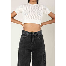 Jean stretch coupe droite et large en denim avec des effets délavés