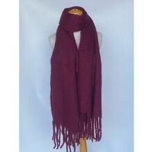 Écharpe unie et épaisse bordée avec des franges décoratives