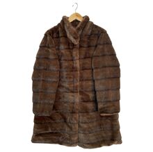 Manteau long en fausse fourrure doux au toucher avec coupe oversize