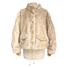 Veste en fausse fourrure au toucher très doux avec poches décoratives