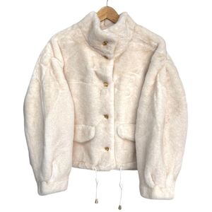 Veste en fausse fourrure au toucher très doux avec poches décoratives