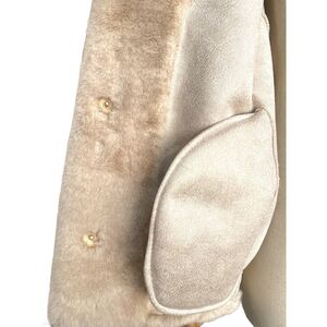 Veste en fausse fourrure effet vison  avec un toucher d'une grande douceur