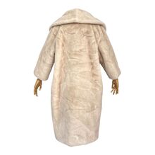 Long manteau oversize en fausse fourrure imite à la perfection le vison