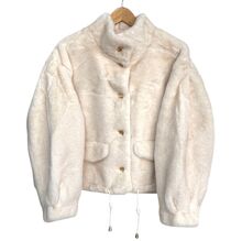 Veste en fausse fourrure au toucher très doux avec poches décoratives