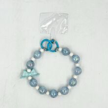 Dragonne de téléphone en perles de cristal irisées avec un gros nœud